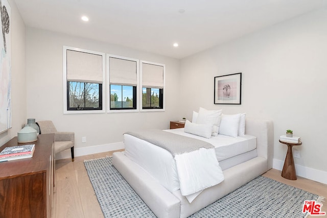 bedroom featuring light hardwood / wood-style flooring