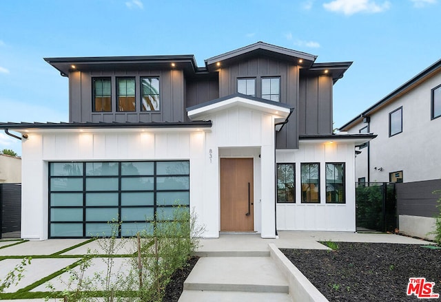 view of front of property with a garage