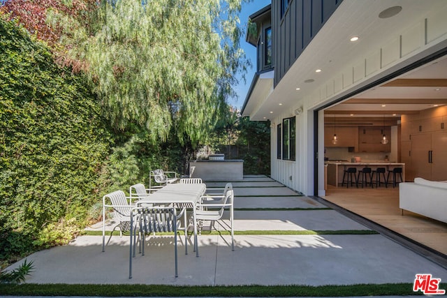 view of patio / terrace with a bar