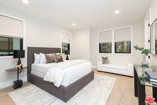 bedroom featuring light hardwood / wood-style floors