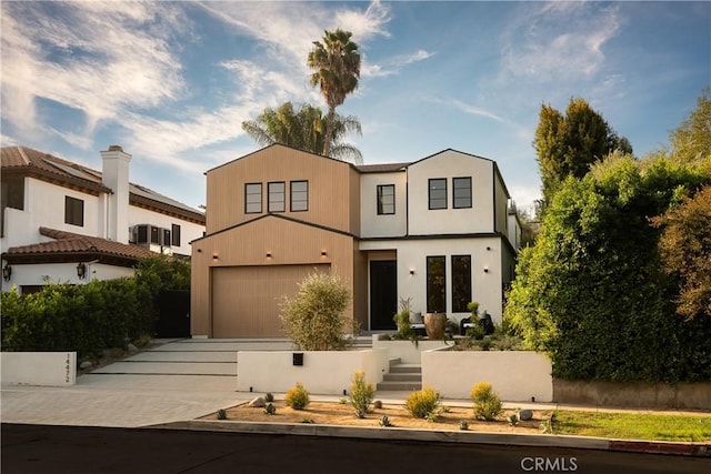 modern home featuring a garage