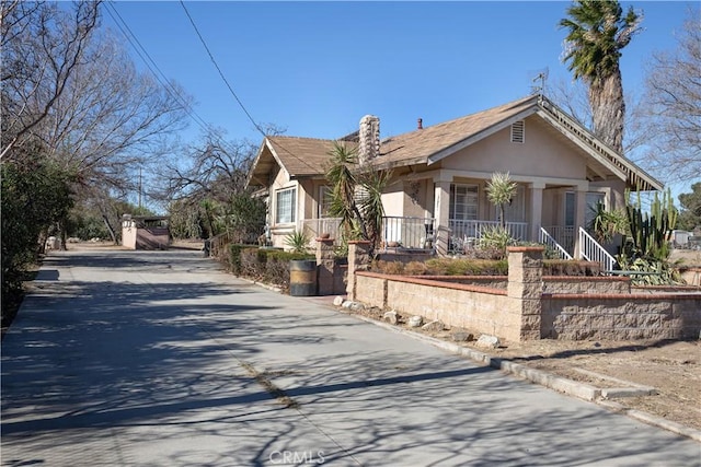 bungalow-style home with covered porch