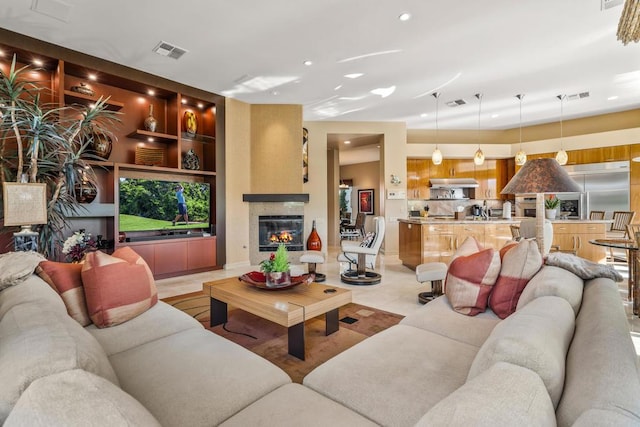 living room featuring built in shelves