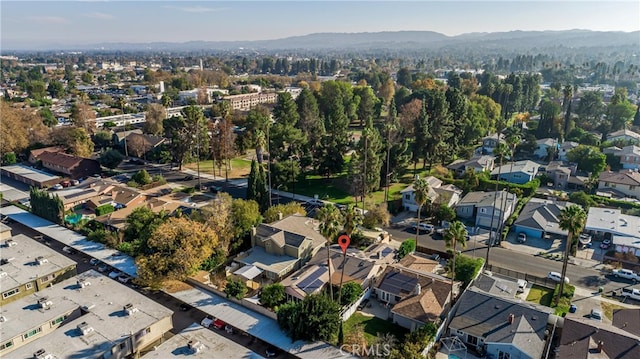 drone / aerial view featuring a mountain view