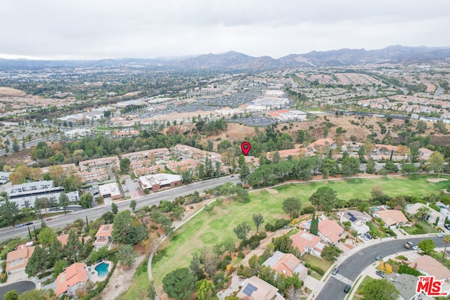 drone / aerial view featuring a mountain view