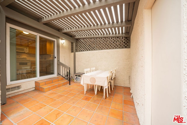 view of patio featuring a pergola