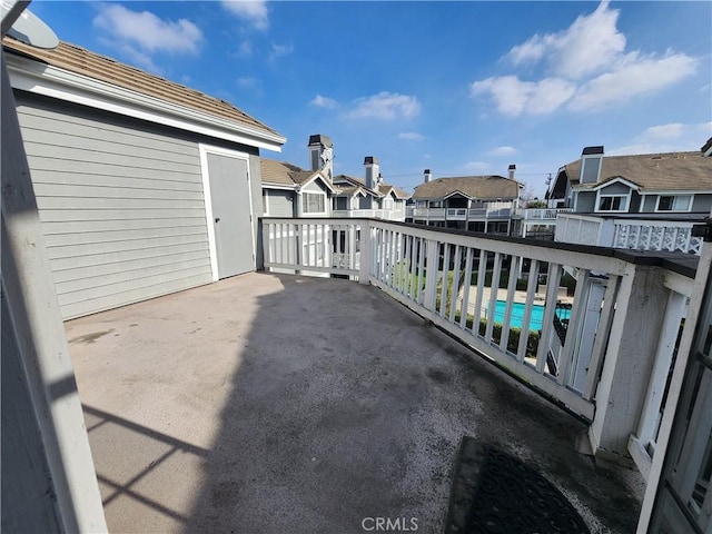 view of patio / terrace with a balcony