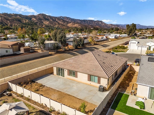 drone / aerial view featuring a mountain view and a residential view