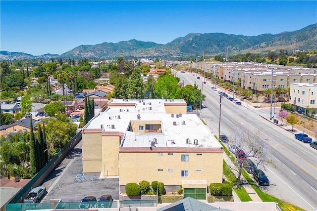 drone / aerial view featuring a mountain view