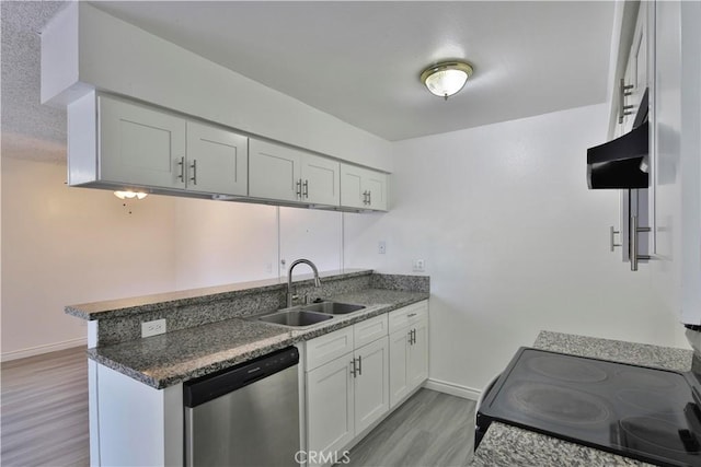 kitchen featuring dishwasher, white cabinetry, sink, kitchen peninsula, and light hardwood / wood-style flooring