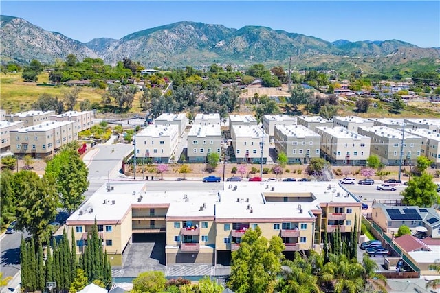 drone / aerial view featuring a mountain view