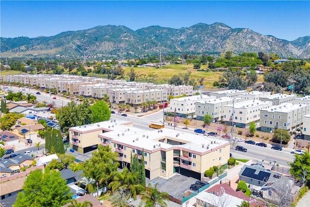 drone / aerial view featuring a mountain view