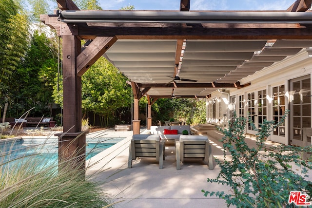 view of patio / terrace with french doors, ceiling fan, and outdoor lounge area