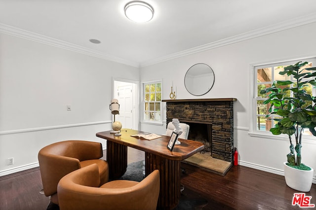 office featuring dark hardwood / wood-style flooring, a fireplace, and ornamental molding