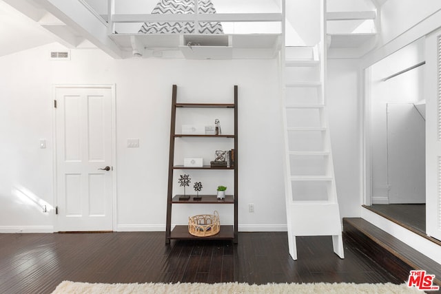 interior space featuring dark hardwood / wood-style flooring