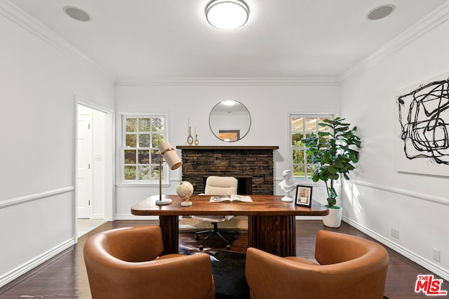 office space featuring a fireplace, dark hardwood / wood-style flooring, and ornamental molding