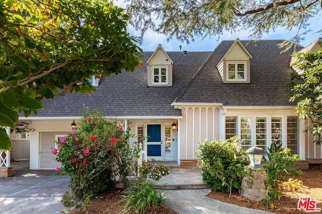 view of new england style home