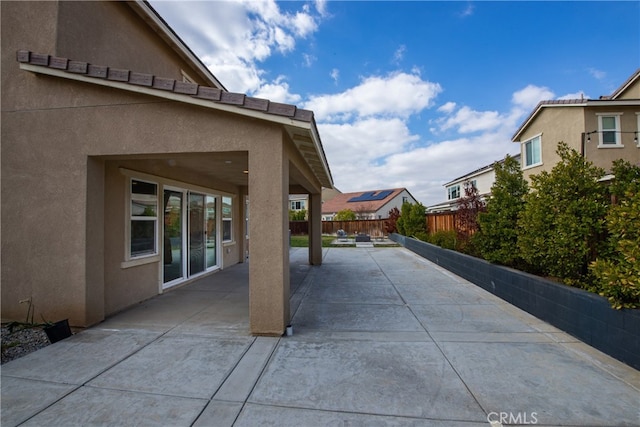 view of patio with fence