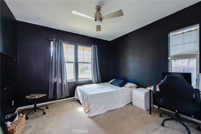 bedroom featuring carpet floors and a ceiling fan