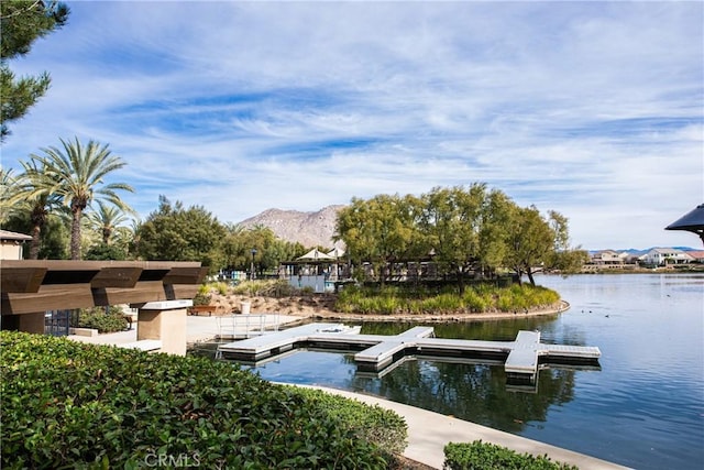 dock area with a water and mountain view