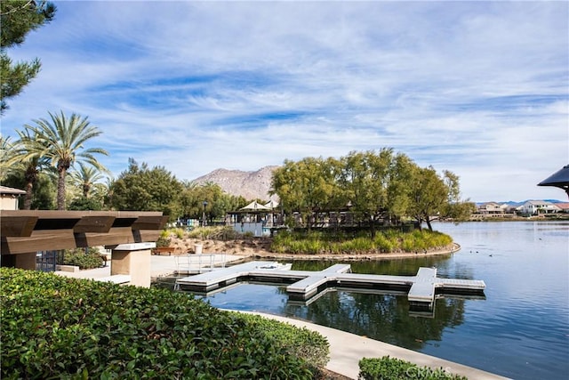 dock area featuring a water and mountain view