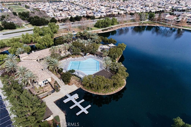 aerial view featuring a water view and a residential view