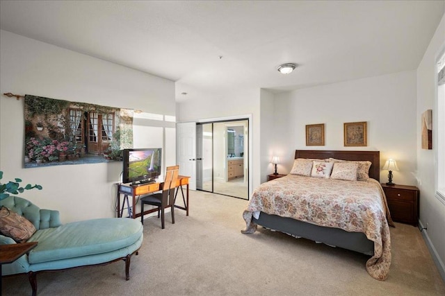 bedroom featuring multiple windows and light carpet