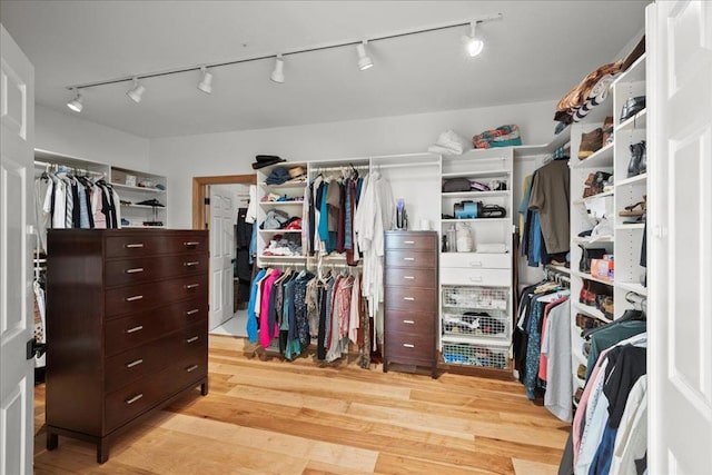 walk in closet featuring light wood-type flooring