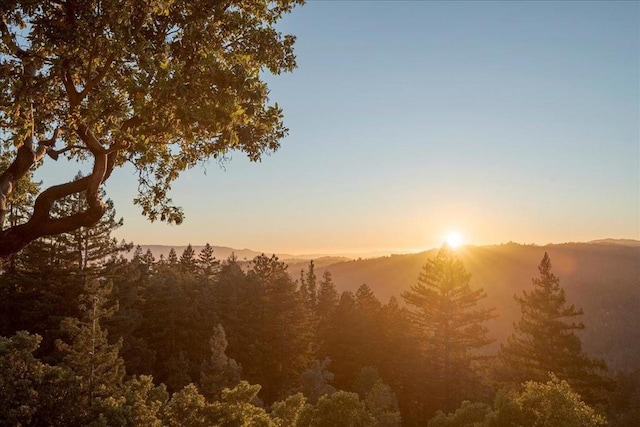 nature at dusk featuring a mountain view