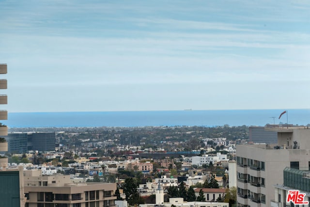 property's view of city featuring a water view