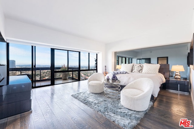 bedroom with hardwood / wood-style flooring