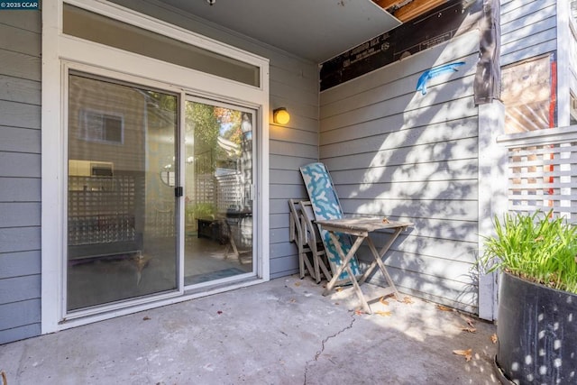 doorway to property featuring a patio