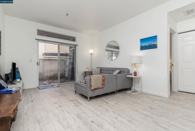 living room with light wood-type flooring