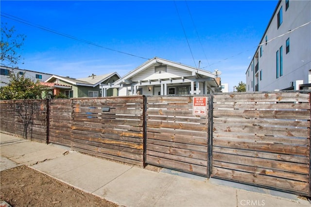 exterior space featuring a gate