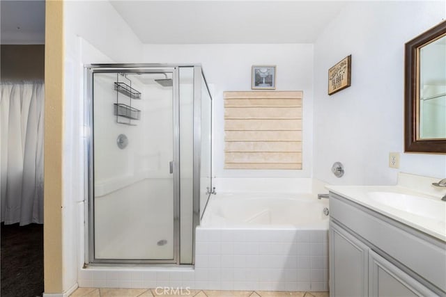 bathroom with vanity, tile patterned flooring, and independent shower and bath