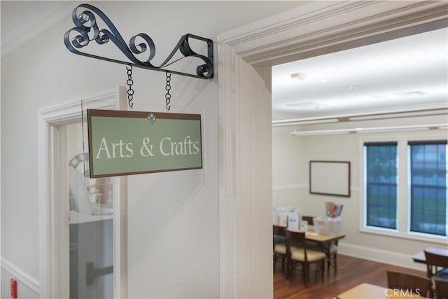 interior details featuring hardwood / wood-style flooring