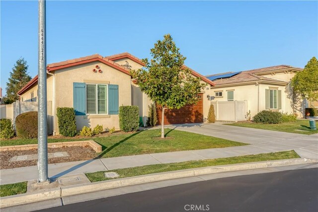 mediterranean / spanish home featuring solar panels