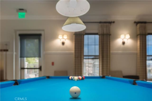 playroom with pool table and ornamental molding