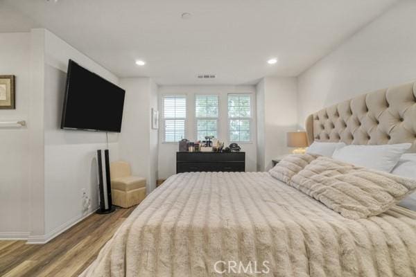 bedroom featuring light wood-type flooring