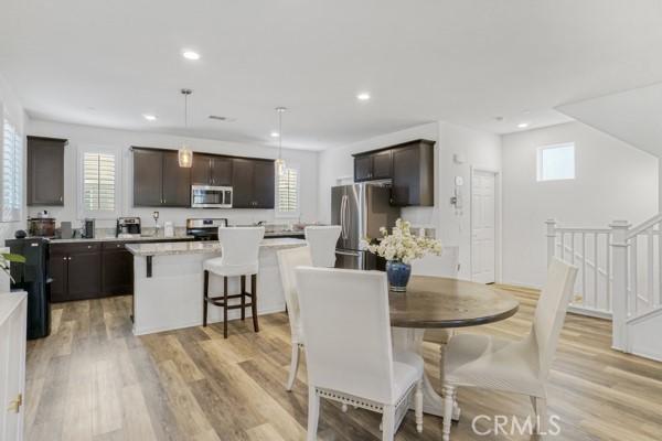 dining room with light hardwood / wood-style floors