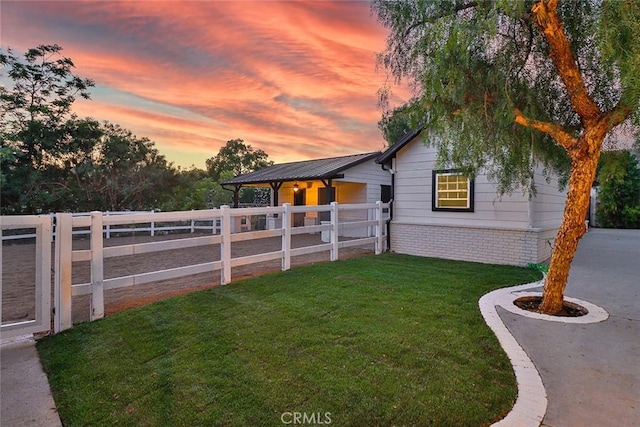 exterior space with a lawn