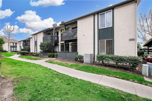 view of property with central AC