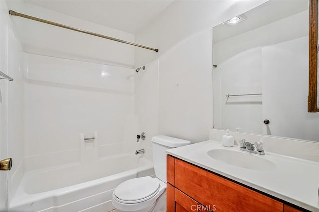 full bathroom with shower / bathtub combination, toilet, and vanity