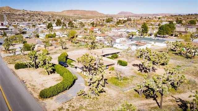 bird's eye view with a mountain view