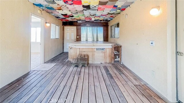 interior space with a hot tub