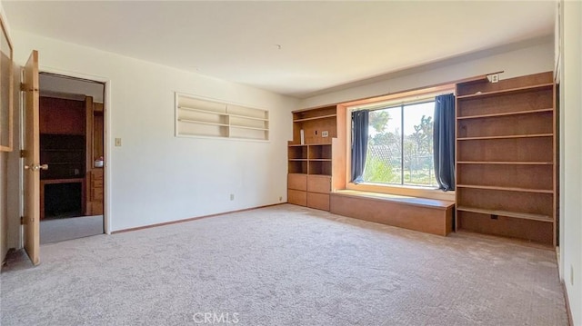 unfurnished bedroom featuring carpet floors