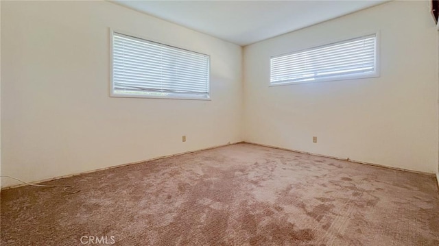 view of carpeted spare room