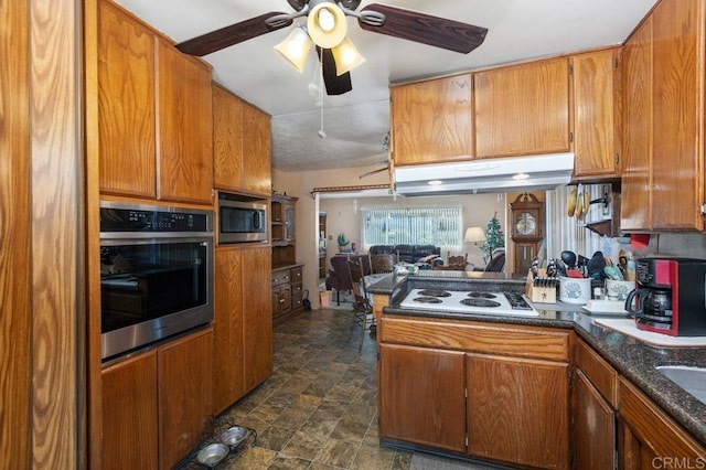 kitchen featuring ceiling fan and appliances with stainless steel finishes