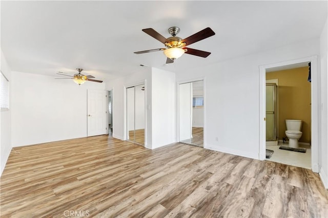 interior space featuring a ceiling fan and light wood-type flooring