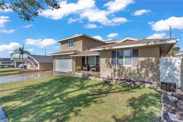 view of front of property with a garage, stucco siding, concrete driveway, and a front yard